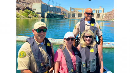 Touring the Sheriff's Department Colorado River Station Marine Enforcement Unit. In the picture are Lt. Jacob Gault, Third District Chief of Staff Claire Cozad, Captain Ross Tarangle, and Supervisor Rowe