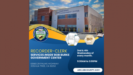 This poster advertises San Bernardino County Assessor-Recorder-Clerk services being offered in Joshua Tree. It includes a picture of the Bob Burke Government Center, the official logo for the San Bernardino County Assessor-Recorder-Clerk, a picture of documents, a picture of wedding rings, and the following words: RECORDER-CLERK SERVICES INSIDE BOB BURKE GOVERNMENT CENTER 63665 29 PALMS HIGHWAY JOSHUA TREE, CA 92252 2nd & 4th Wednesday of every month. 9:30 AM to 3:00 PM ARC.SBCOUNTY.GOV