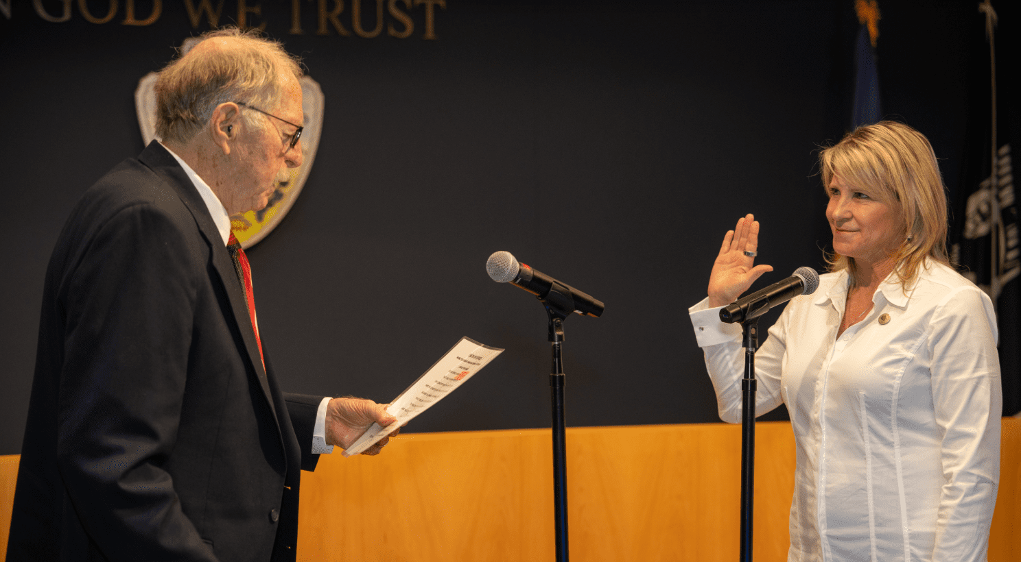 Supervisor Rowe's father administers the Oath of Office