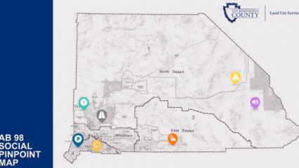 Graphic from San Bernardino County Land Use Services showing an “AB 98 Social Pinpoint Map” of San Bernardino County with color-coded location markers highlighting areas for public feedback related to truck routes and traffic concerns in unincorporated communities. The county and department logos appear in the upper-right corner.