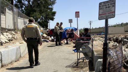 Members of the San Bernardino County Sheriff's Department HOPE Team make contact with unhoused individuals in the county.