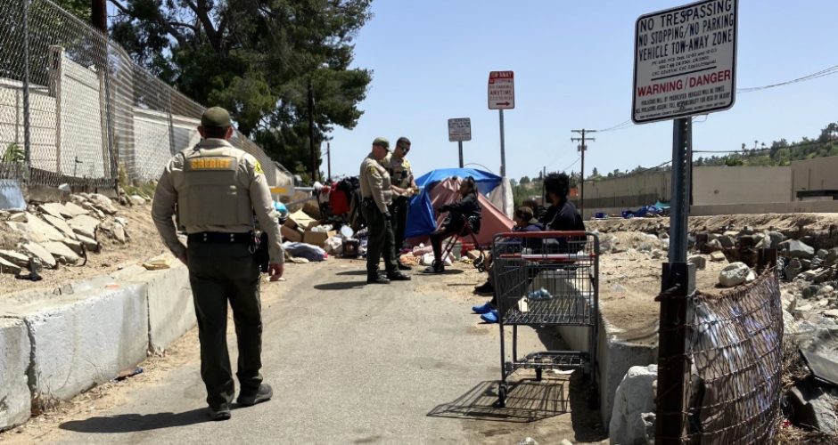 Members of the San Bernardino County Sheriff's Department HOPE Team make contact with unhoused individuals in the county.