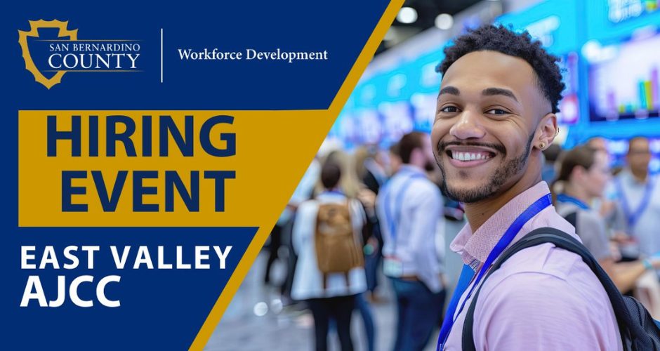 Graphic promoting a San Bernardino County Workforce Development hiring event. The design features the county logo, the words “Hiring Event” and “East Valley AJCC” in bold blue and gold text, alongside a smiling job seeker wearing a conference badge in a busy networking environment.